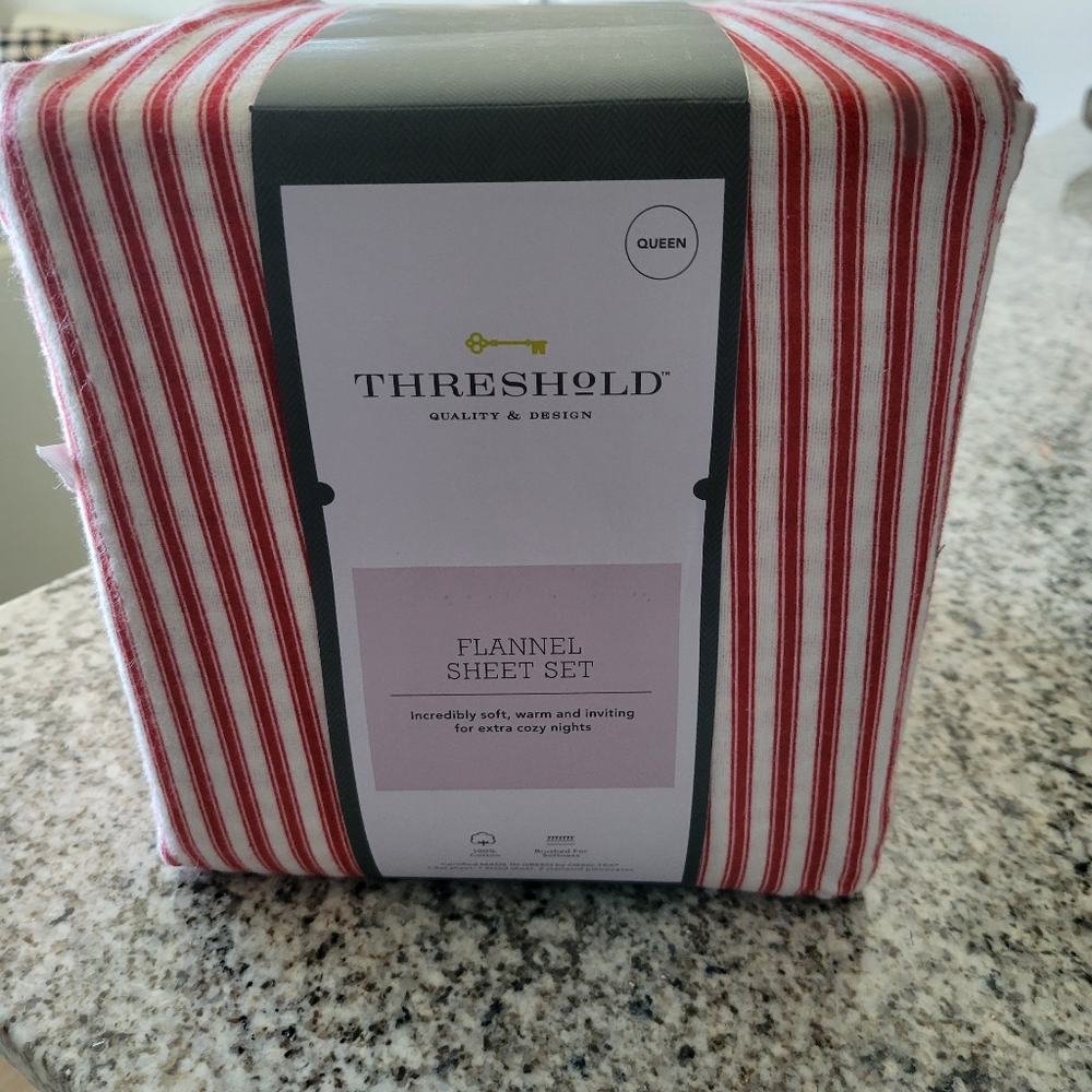 Threshhold striped flannel sheets.
